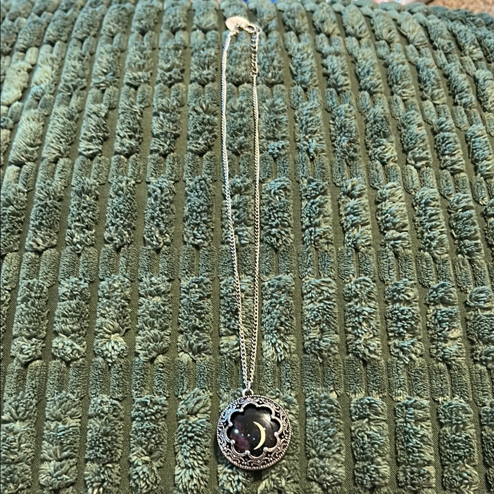 Elegant Silver and Black Necklace with Timeless Charm